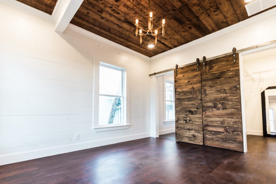 Denton TX Contractor, General Contractor Denton, DFW Contractor, Residential renovations Denton, Home renovations DFW, Denton Construction Companies, DFW construction companies, barn door, sliding barn door, double barn door, shiplap, painted shiplap, gold chandelier, walk-in closet, master suite