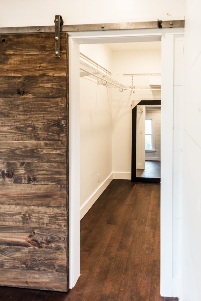 Denton TX Contractor, General Contractor Denton, DFW Contractor, Residential renovations Denton, Home renovations DFW, Denton Construction Companies, DFW construction companies, barn door, sliding barn door, double barn door, shiplap, painted shiplap, gold chandelier, walk-in closet, master suite