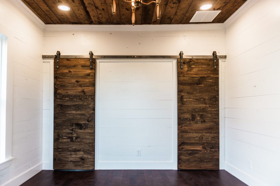 Denton TX Contractor, General Contractor Denton, DFW Contractor, Residential renovations Denton, Home renovations DFW, Denton Construction Companies, DFW construction companies, barn door, sliding barn door, double barn door, shiplap, painted shiplap, gold chandelier, walk-in closet, master suite